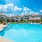 Poolside with floors and chairs in the water