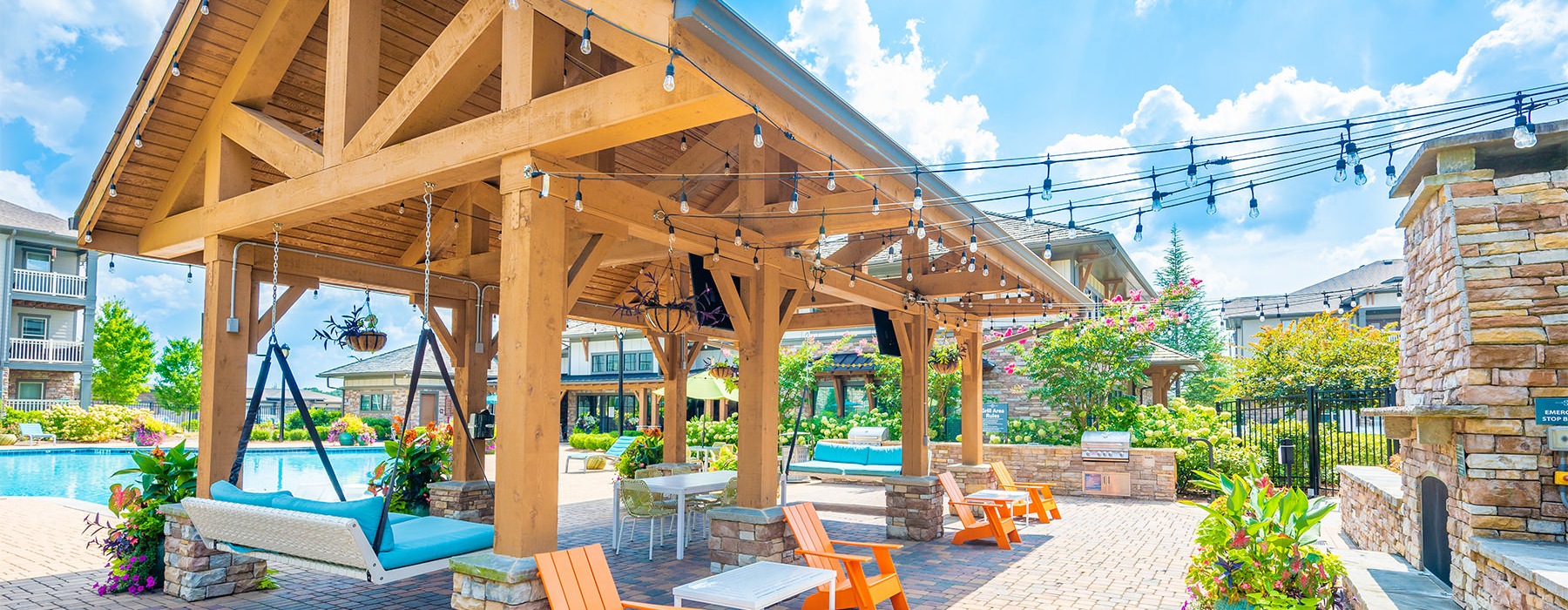gazebo with chairs and strung lights