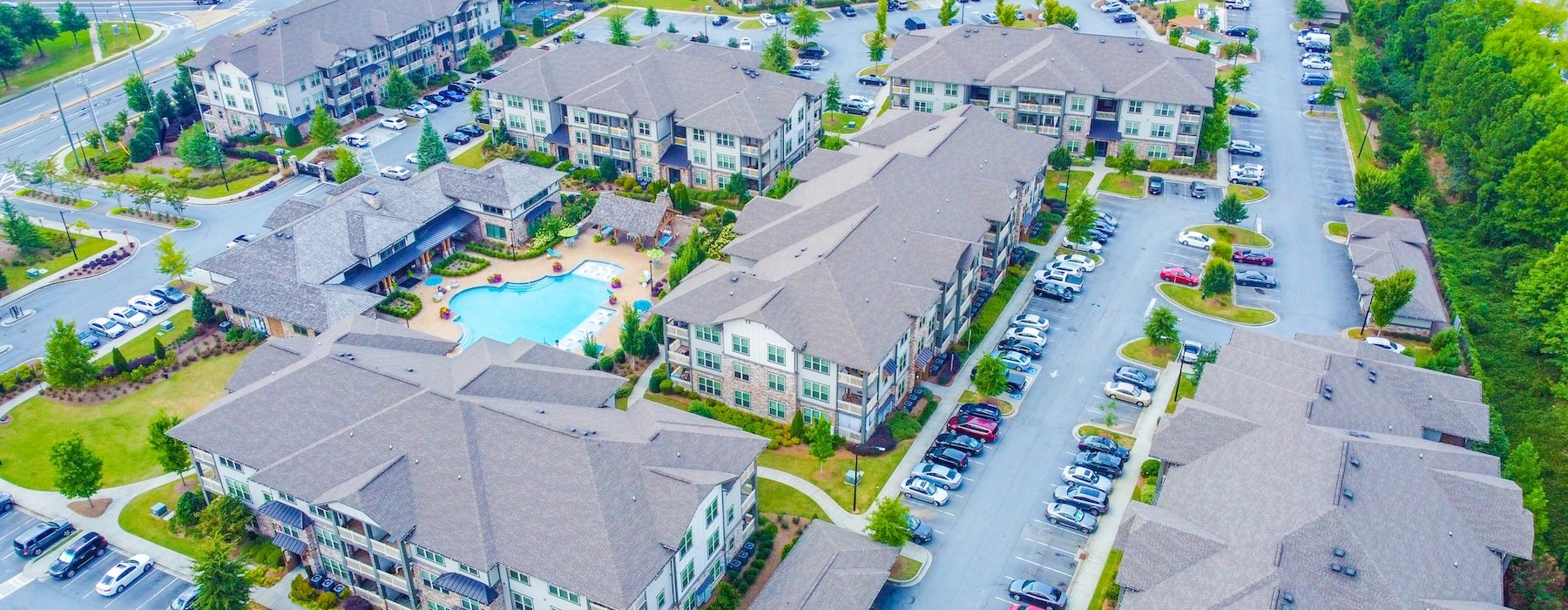an aerial view of an apartment complex