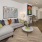 a living room with a couch and a table