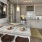 a kitchen with a table and chairs