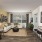 a living room with a couch and dining table
